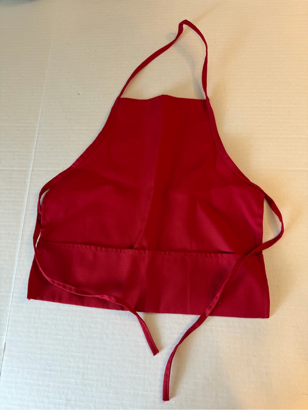 Kid’s red utility apron, art smock, cooking apron
